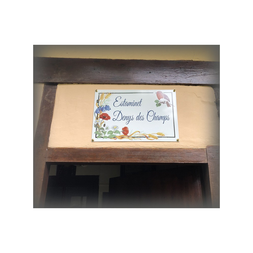 I thank this customer who kindly sent me the photo of his plate installed above his front door