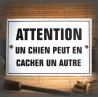 Plaque émaillée "Attention un chien peut en cacher un autre"