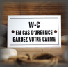 Plaque émaillée 10x6cm "WC en cas d'urgence garder votre calme" avec filet