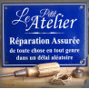 Enamel sign "Le Petit Atelier : réparation assurée"