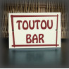 Plaque émaillée "Toutou Bar" avec filet 15x10cm