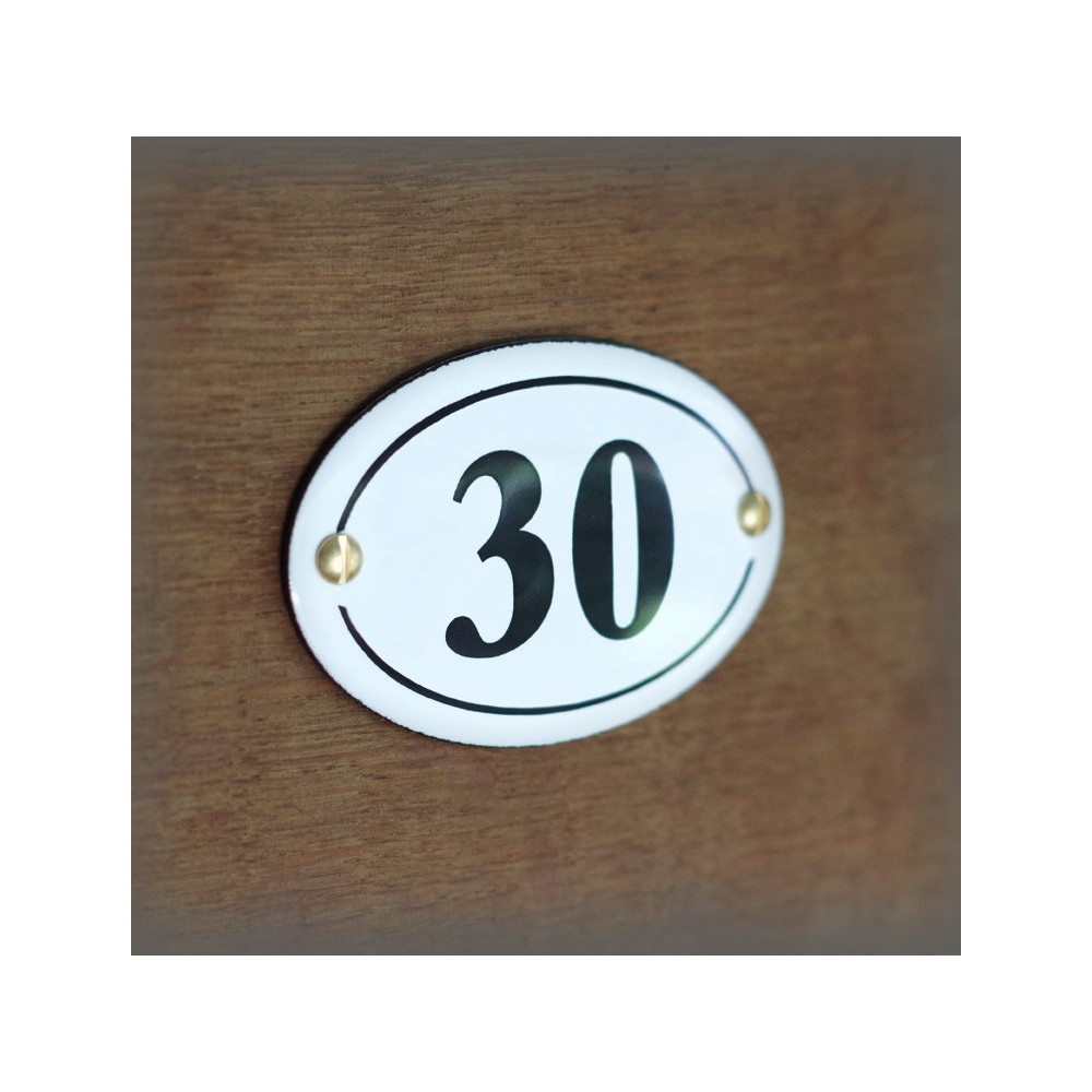 Enamel oval incurved number in the old 2,8x1,6 inches
