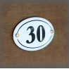 Enamel oval incurved number in the old 2,8x1,6 inches