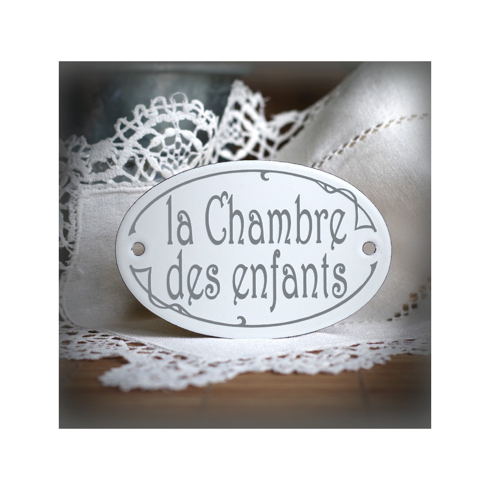 Plaque ovale de porte émaillées blanc texte gris : la Chambre des enfants